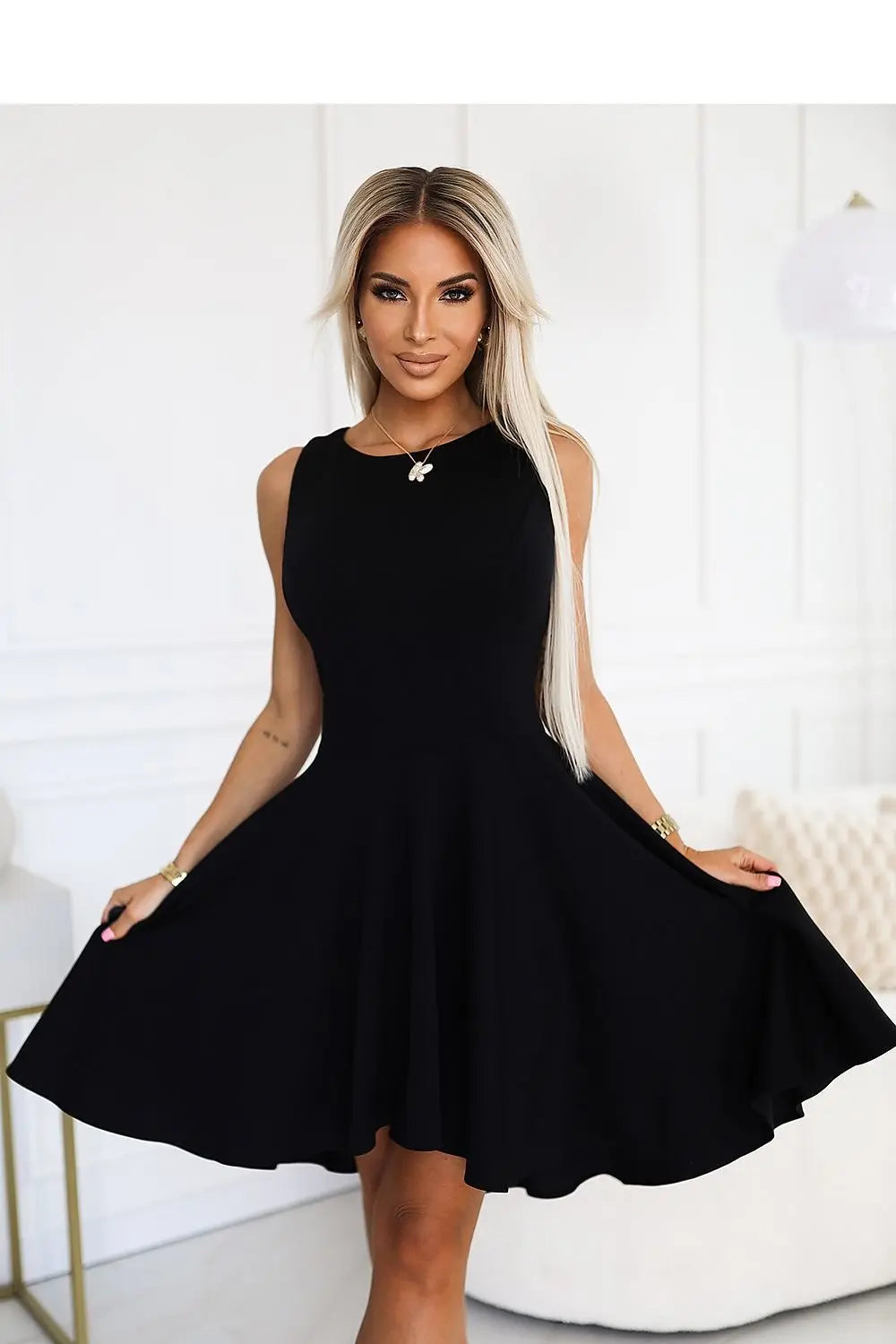 Elegant Black Asymmetrical Dress by Numoco with Longer Back Numoco